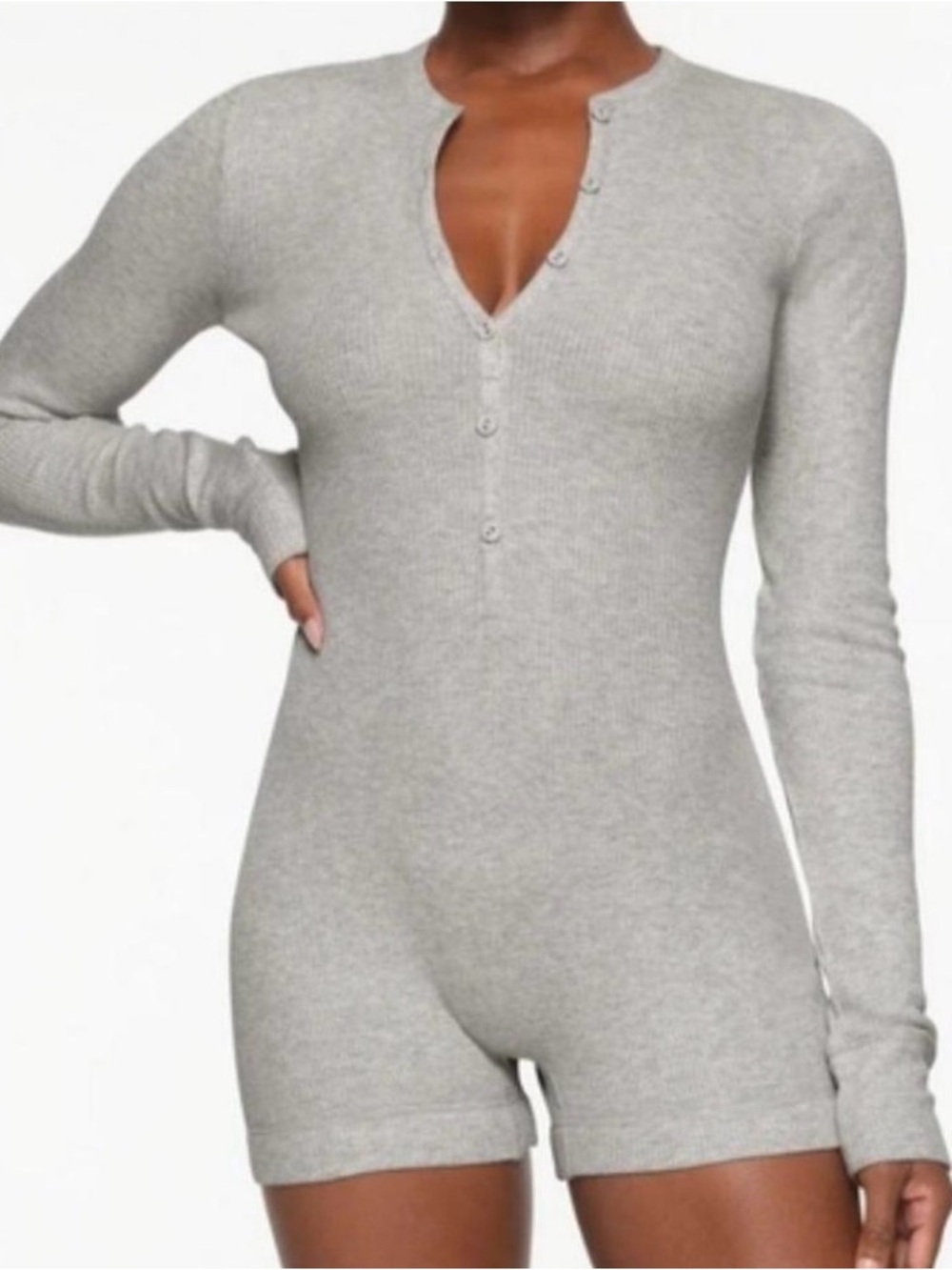 Brand new TNA long sleeve romper